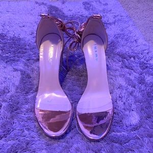 This chrome sparkly heels have only been worn one time .